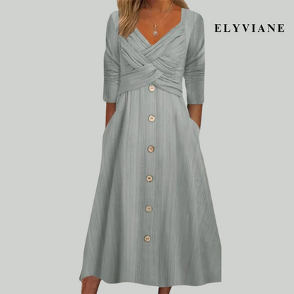 Elena – Elegancka i Wzmacniająca Sukienka z Guzikami i Krzyżowymi Szczegółami